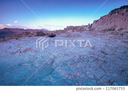 Sunrise over Masada fortress. Ruins of King Herod's palace in the Judaean Desert Sunrise over Masada fortress. Ruins of King Herod's palace in the Judaean Desert 117065755