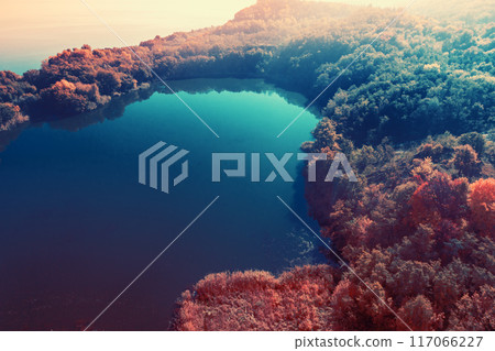 Picturesque mountain lake in autumn. Lake next to the sea. Beautiful wilderness. Aerial view Picturesque mountain lake in autumn. Lake next to the sea. Beautiful wilderness. Aerial view 117066227