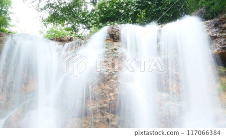 Landscape with a waterfall Landscape with a waterfall 117066384