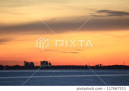 Summer sky dyed orange by the morning glow 117067551