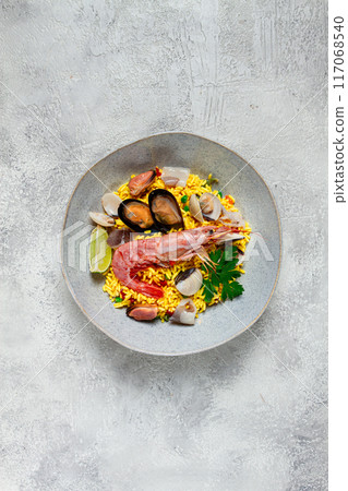 seafood paella, on a plate, traditional Spanish dish, top view, no people, seafood paella, on a plate, traditional Spanish dish, top view, no people, 117068540