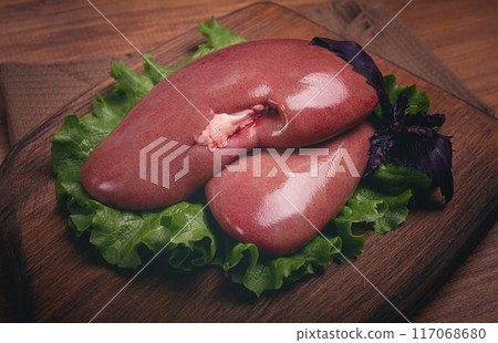 raw pork kidneys, on a chopping board, close-up, top view, no people, raw pork kidneys, on a chopping board, close-up, top view, no people, 117068680
