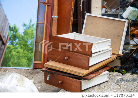 A pile of wooden drawers is stacked, showcasing their design 117070124