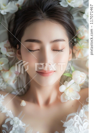 Elegant woman's relaxed face Thai massage soft natural light magazine photography 117071467