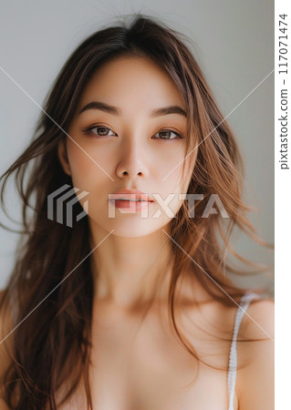 Elegant woman's relaxed face Thai massage soft natural light modern spa Elegant woman's relaxed face Thai massage soft natural light modern spa 117071474