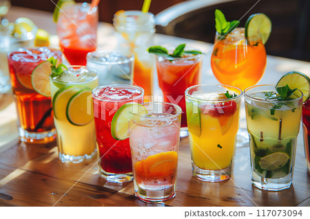 Array of summer cocktails, served chilled on a bar table, Array of summer cocktails, served chilled on a bar table, 117073094