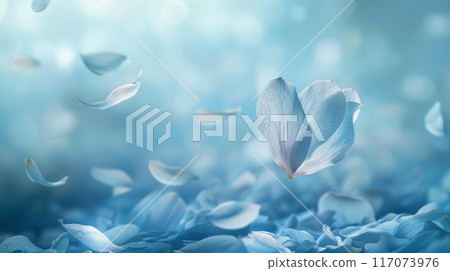 Soft, pastel blue background with a gently falling petal 117073976