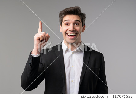 Genius Idea. Resourceful 30S Aged businessman.Eureka Moment,Pointing Finger Up Genius Idea. Resourceful 30S Aged businessman.Eureka Moment,Pointing Finger Up 117075553