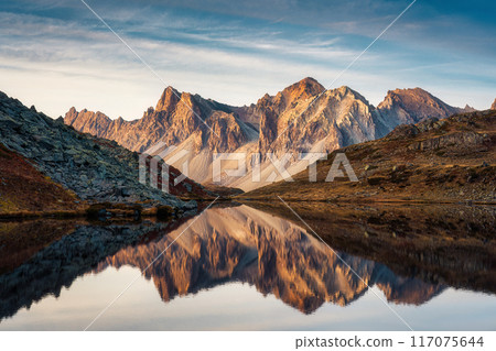 Landscape of Lac Long with Massif Des Cerces reflection during autumn in Claree valley at France 117075644