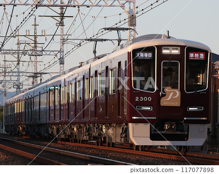 Evening Hankyu 2300 series semi-express train bound for Osaka Umeda, Ibaraki City to Minami Ibaraki 117077898
