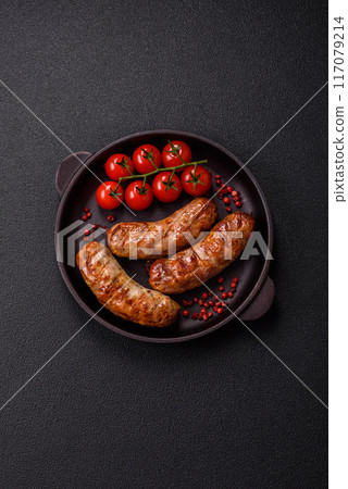 Grilled pork or chicken sausages with salt, spices and herbs 117079214