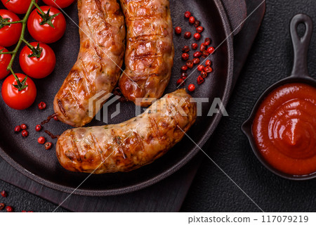 Grilled pork or chicken sausages with salt, spices and herbs 117079219