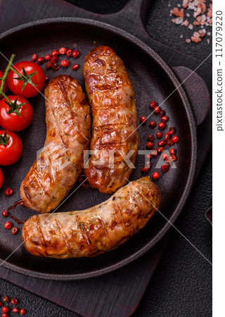 Grilled pork or chicken sausages with salt, spices and herbs 117079220