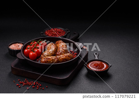 Grilled pork or chicken sausages with salt, spices and herbs 117079221
