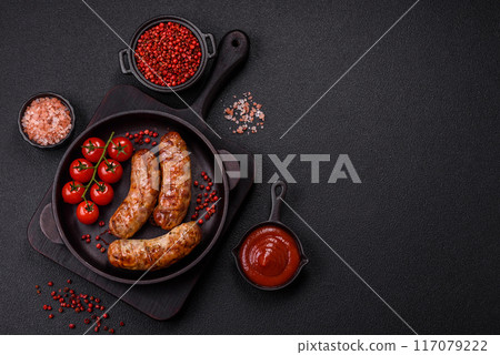 Grilled pork or chicken sausages with salt, spices and herbs Grilled pork or chicken sausages with salt, spices and herbs 117079222