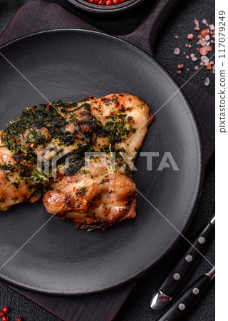 Grilled boneless chicken thigh with salt, spices and herbs Grilled boneless chicken thigh with salt, spices and herbs 117079249