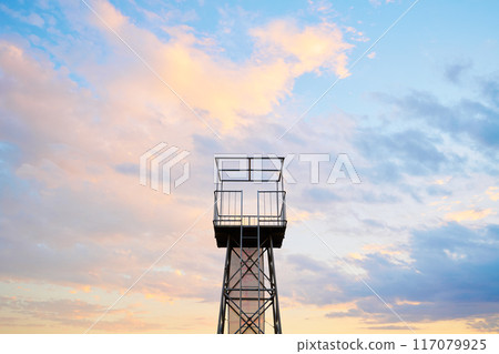 Tower and sunset sky 117079925
