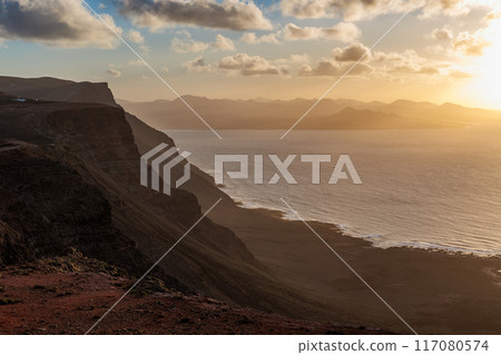 Sunset over the landscape around Mirador del Rio on the island of Lanzarote, Canary Islands 117080574