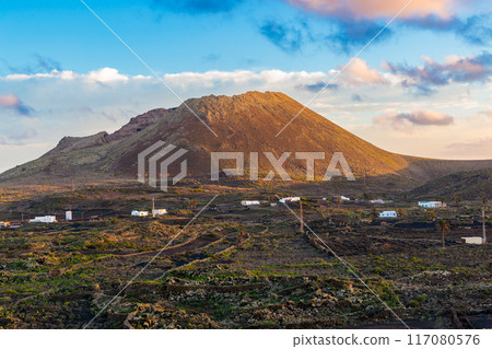 Sunset over the landscape around Mirador del Rio on the island of Lanzarote, Canary Islands 117080576