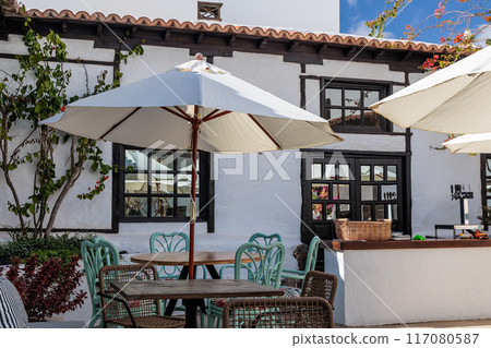 Cozy sitting in a restaurant in Haria, Lanzarote, Canary Islands Cozy sitting in a restaurant in Haria, Lanzarote, Canary Islands 117080587