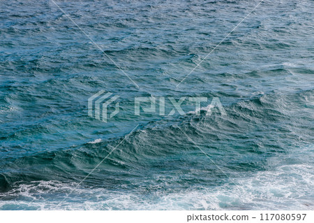 Subtly blackened surface off the coast of the Atlantic Ocean, Lanzarote, Canary Islands 117080597