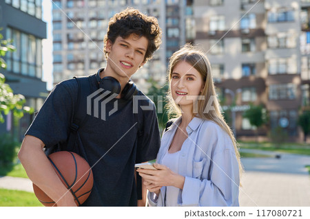 Portrait of young students guy and girl, outdoors together 117080721