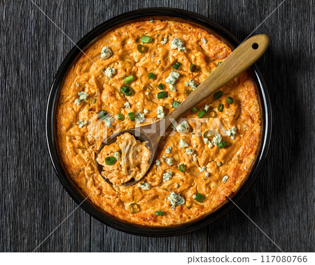 hot buffalo chicken dip in baking dish, top view hot buffalo chicken dip in baking dish, top view 117080766