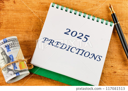 Text 2025 predictions on a blank sheet of notepad against a papyrus background 117081513