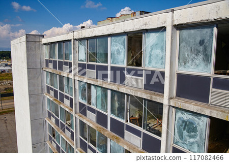 Aerial View of Derelict Industrial Building Facade with Broken Windows in Ohio 117082466