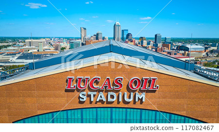Aerial Detail of Lucas Oil Stadium Name and Indianapolis Skyline Aerial Detail of Lucas Oil Stadium Name and Indianapolis Skyline 117082467