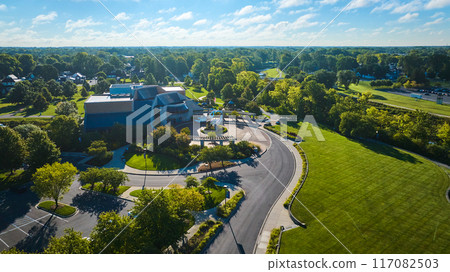 Wide aerial Minnetrista Museum and Gardens on bright, sunny summer day with cloudy blue sky 117082503