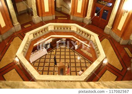 Elegant Government Building Foyer with American Flag, High-Angle View 117082567