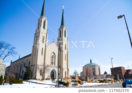 Winter Day at Gothic Cathedral with Blue Sky in Fort Wayne, Indiana 117082578