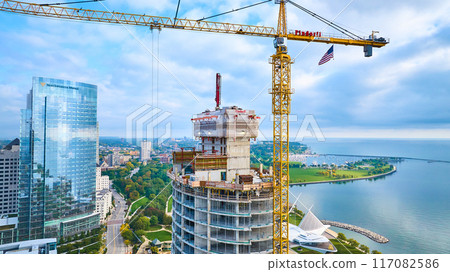 Aerial View of Urban Construction Site and Crane, Milwaukee Skyscape Aerial View of Urban Construction Site and Crane, Milwaukee Skyscape 117082586