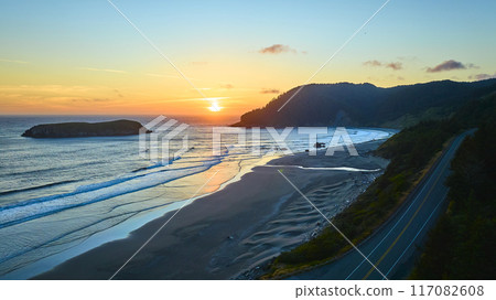 Aerial View of Sunset Over Meyers Creek Beach and Coastal Road Aerial View of Sunset Over Meyers Creek Beach and Coastal Road 117082608