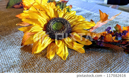 Vivid Yellow Sunflower and Autumn Accents on Burlap 117082616