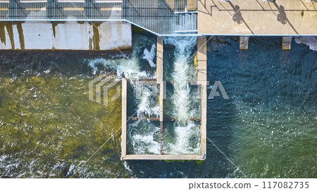 Aerial View of Fish Ladder Spillway with Dynamic Water Motion 117082735