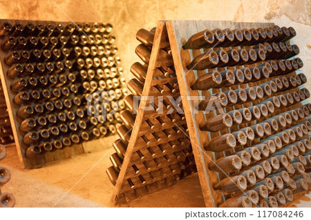 Champagne bottle storage 117084246