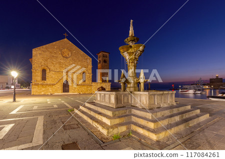 Fountain in front of the Church of the Annunciation of the Virgin Mary in Rhodes. Fountain in front of the Church of the Annunciation of the Virgin Mary in Rhodes. 117084261