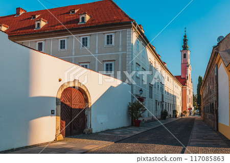 Street with church tower in Old city in Varazdin Varazdin Croatia 11.07.24 117085863