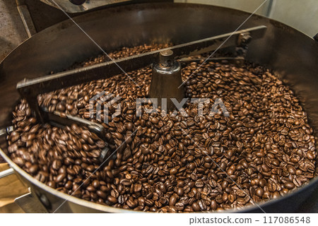coffee beans in the roaster coffee beans in the roaster 117086548