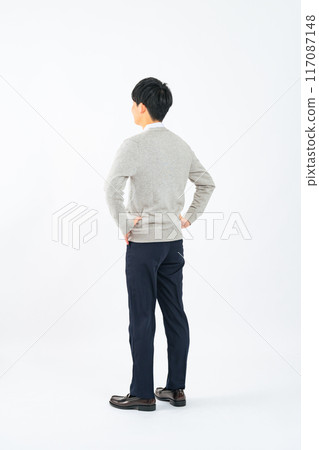Back view of a male student in uniform Back view of a male student in uniform 117087148