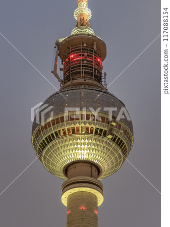 Famous Berlin Television Tower (Fernsehturm) with night sky background. 117088154