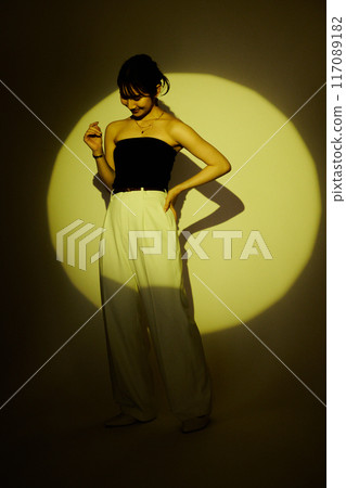 Female portrait using light and shadow color lighting Female portrait using light and shadow color lighting 117089182