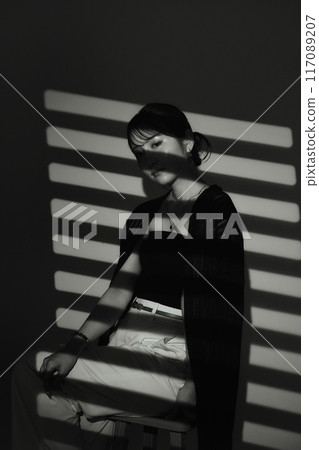 Female portrait in light and shadow Female portrait in light and shadow 117089207