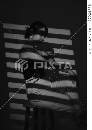 Female portrait in light and shadow Female portrait in light and shadow 117089236
