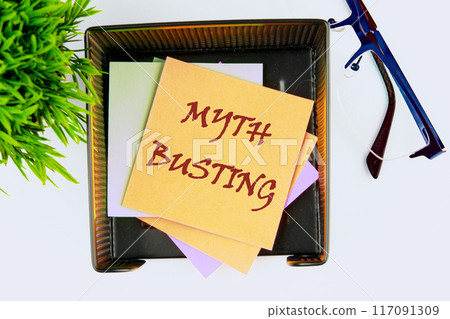 Myth busting word concept on yellow sticker has a top view 117091309