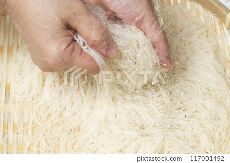 Somen noodles: Soak the somen noodles in water using a colander 117091492