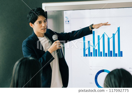 A man giving a presentation A man giving a presentation 117092775