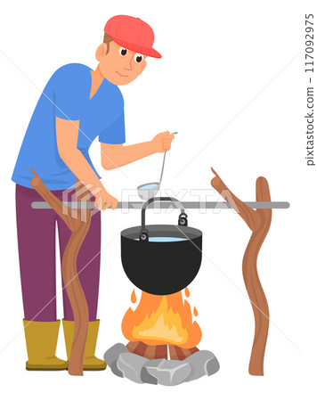 Man cooking food on campfire. Outdoor picnic Man cooking food on campfire. Outdoor picnic 117092975